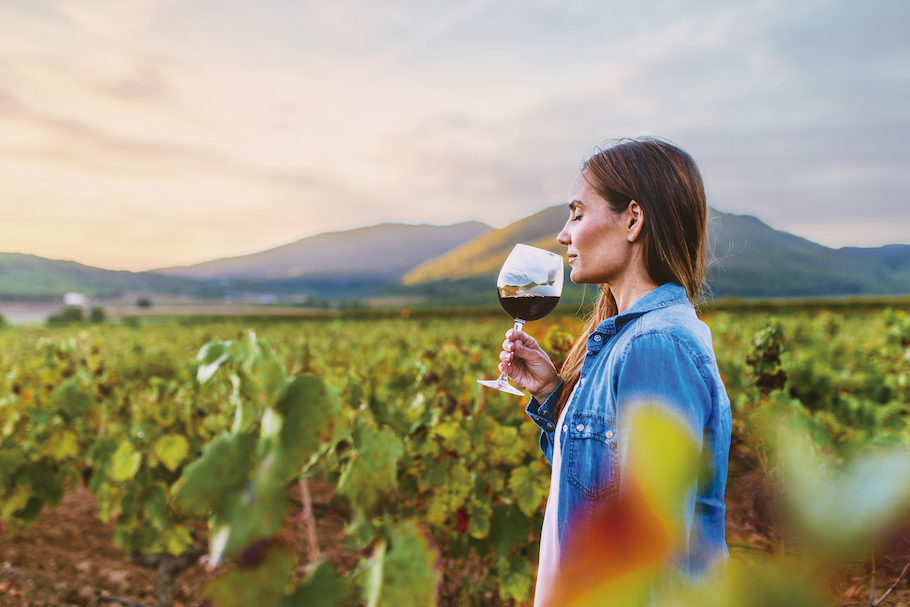 Woman sipping from wine glass